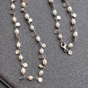 Elegant Silver and Pearl Necklace